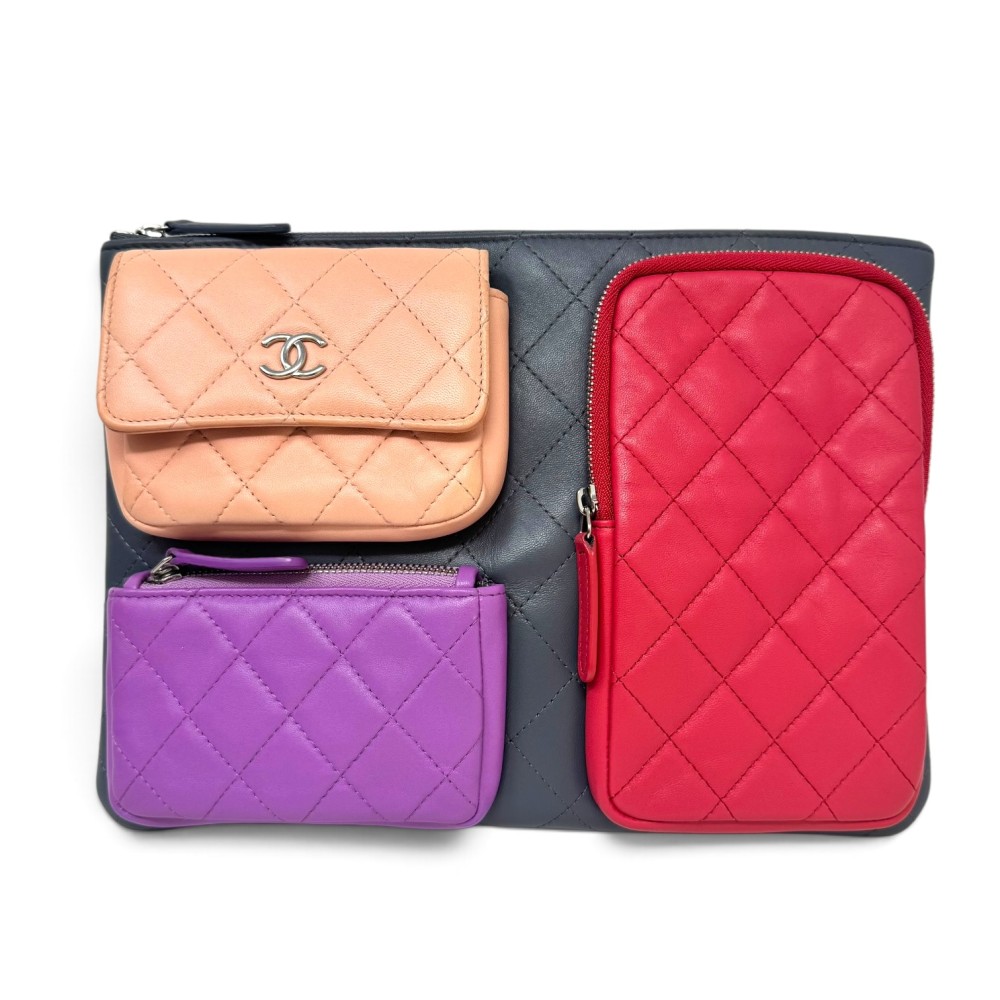 CHANEL EXTRA SPACE CLUTCH